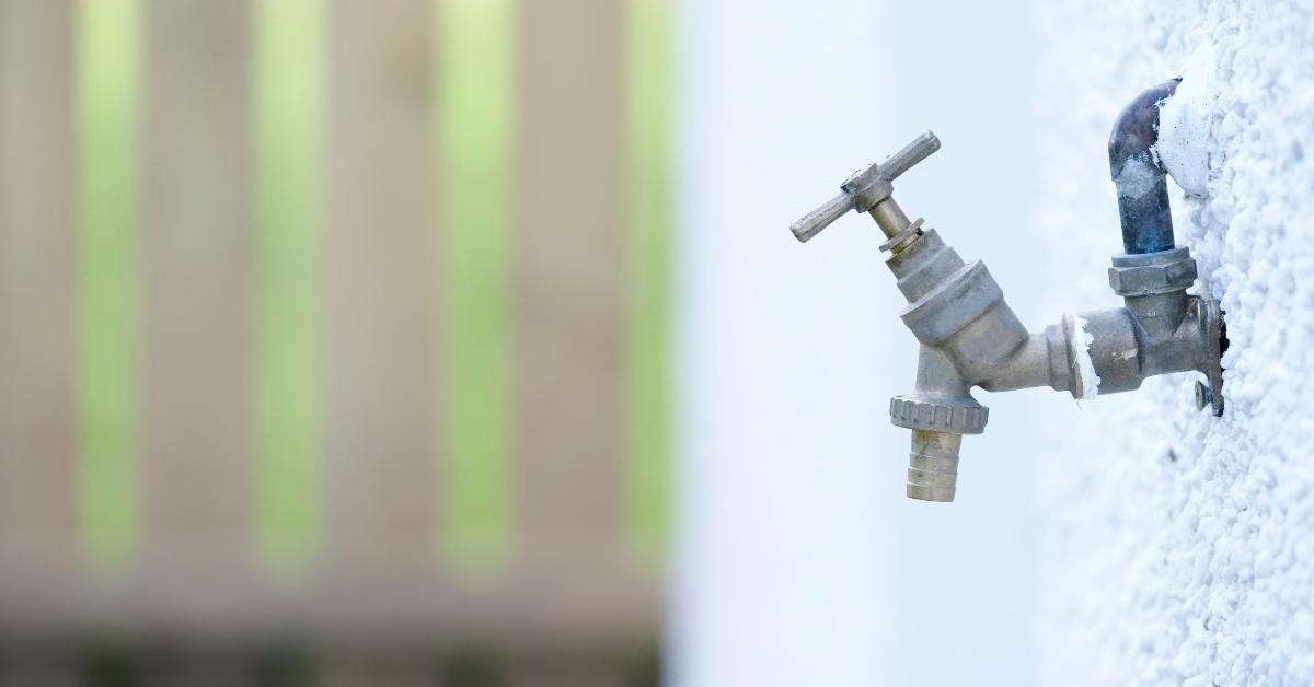 bib tap outdoors on house