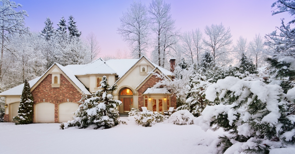 snowy  suburban home