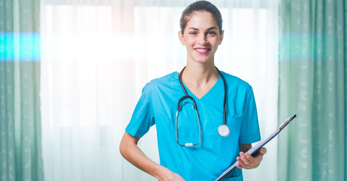 nurse standing in hospital room