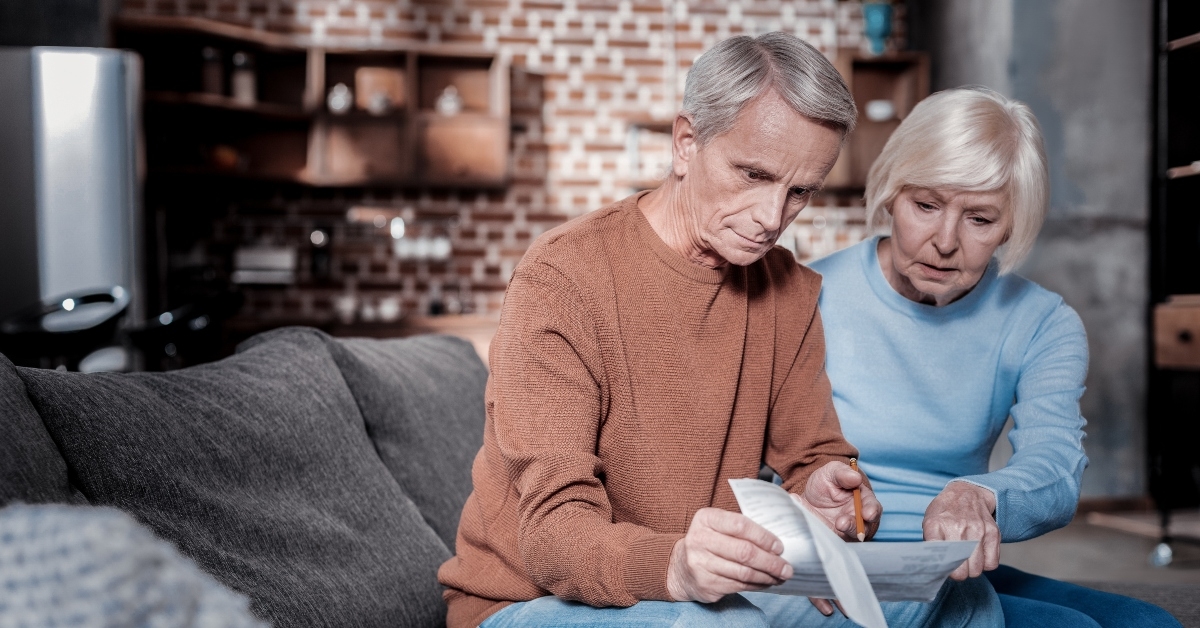 woman pointing at document