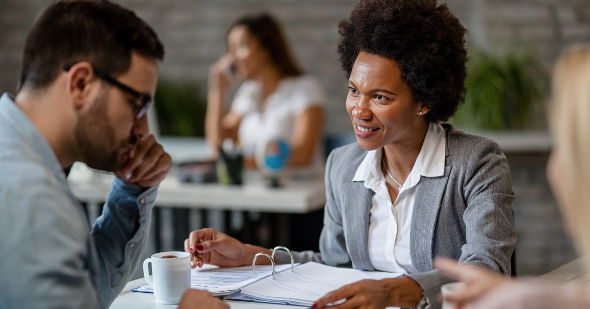 african american financial advisor with client