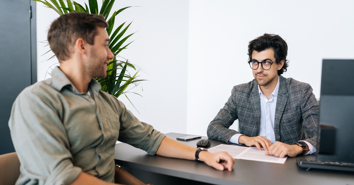 broker advisor in eyeglasses