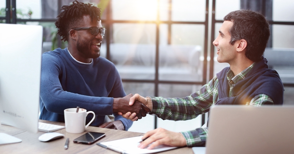 businessman handshakes partner