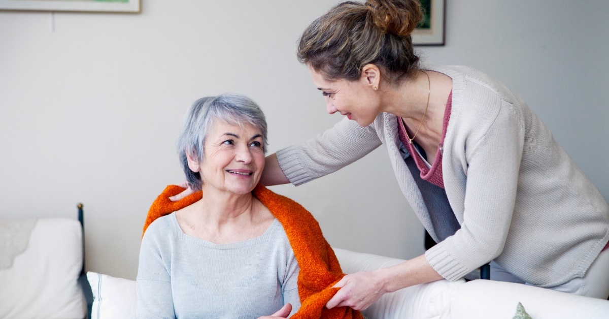 caretaker looking after senior woman