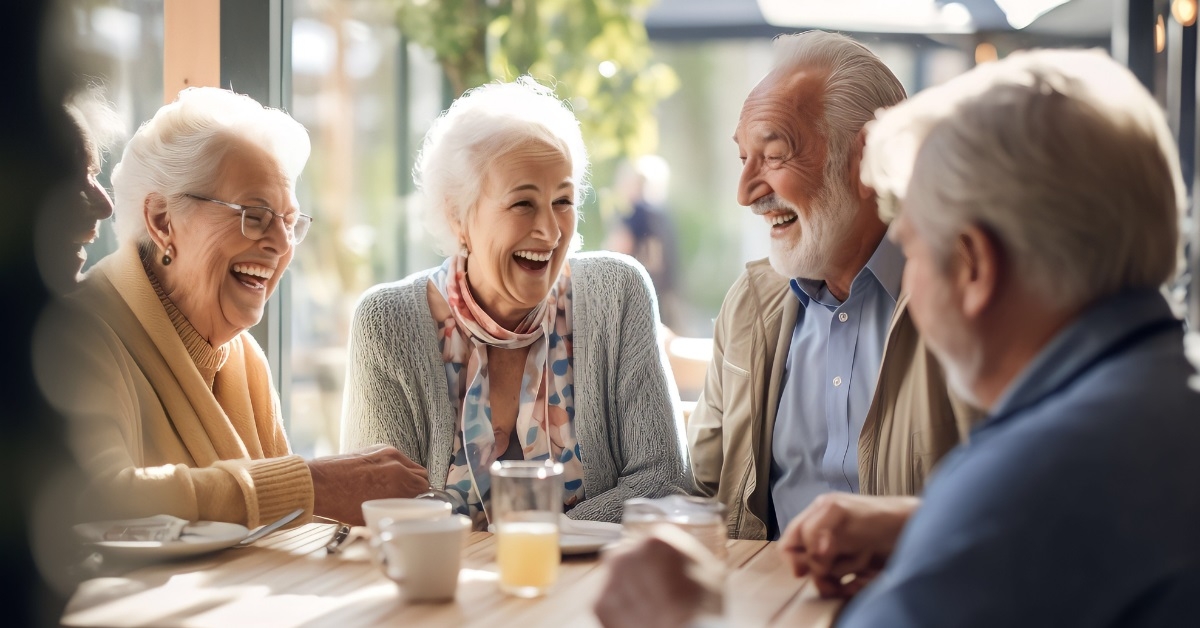 senior friends having lunch in restaurant