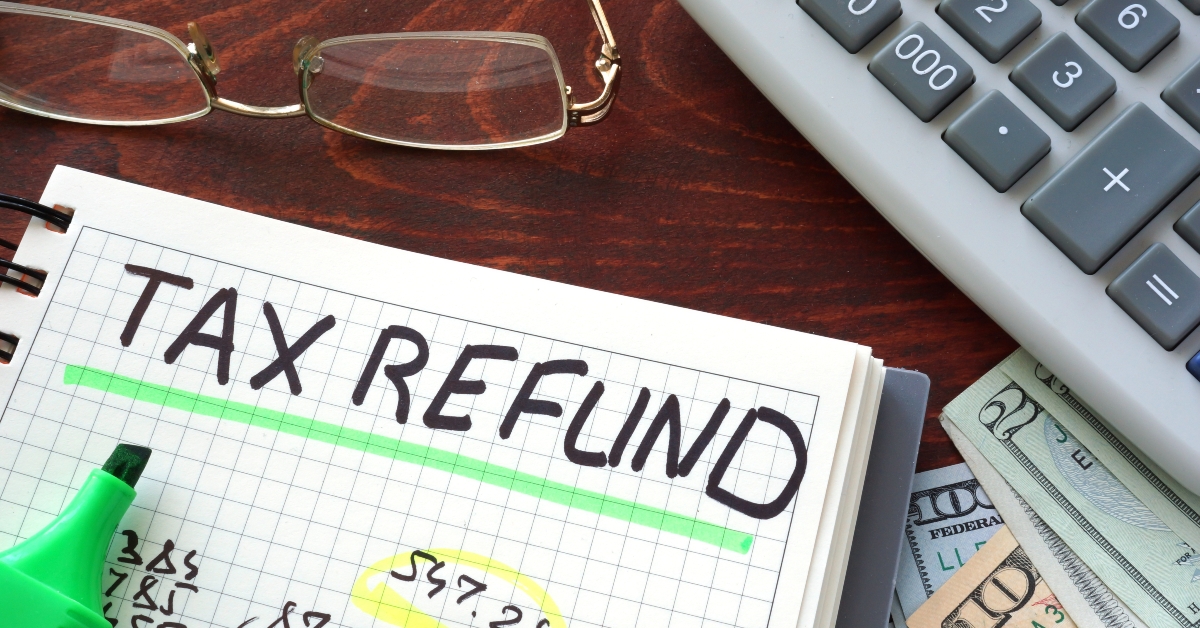 notebook with tax refund sign