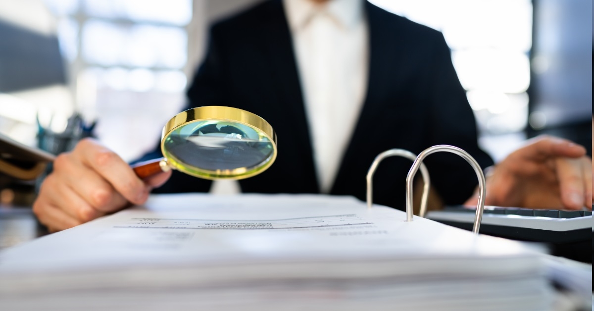 lawyer reviewing tax audit papers
