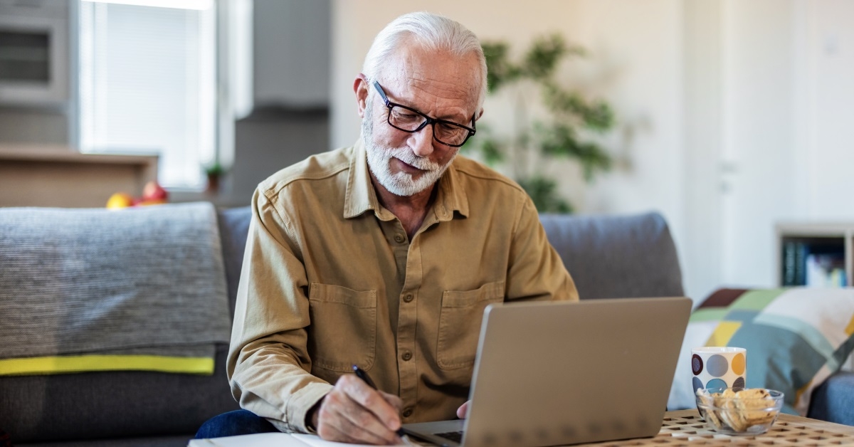 senior man reviewing investments plans