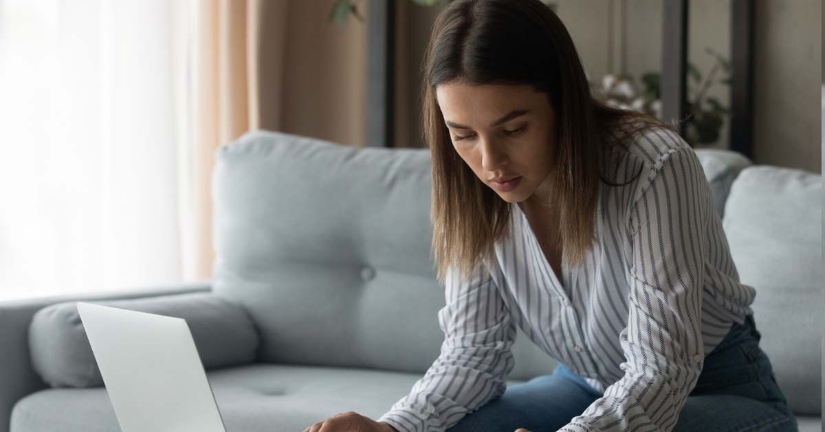 focused female student calculating study loan