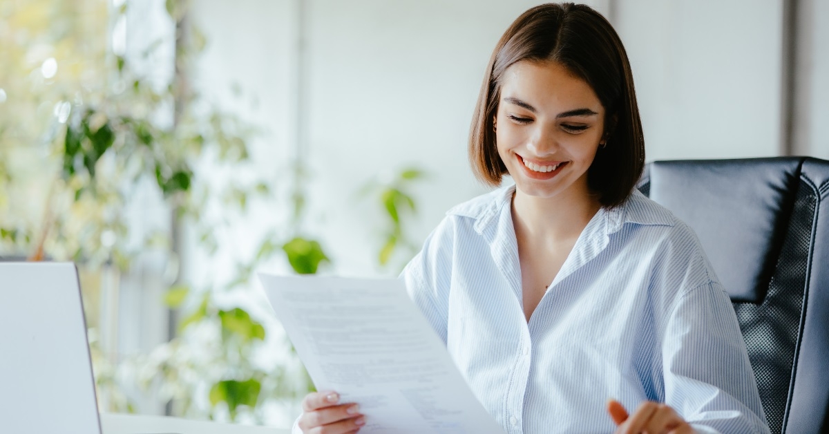 happy business woman working at office