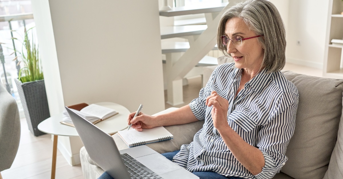 senior business woman attending webinar