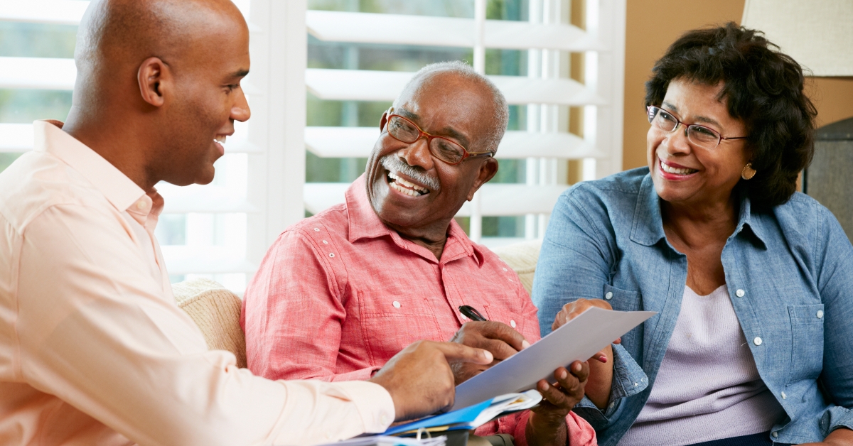 financial advisor talking to couple