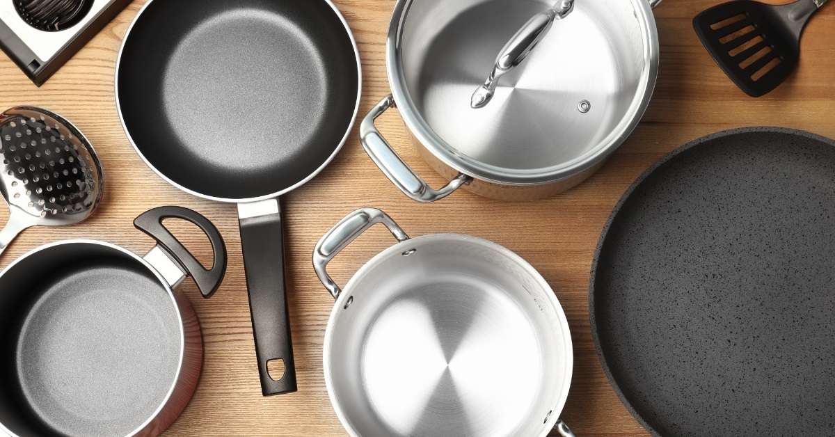 clean cookware on wooden background