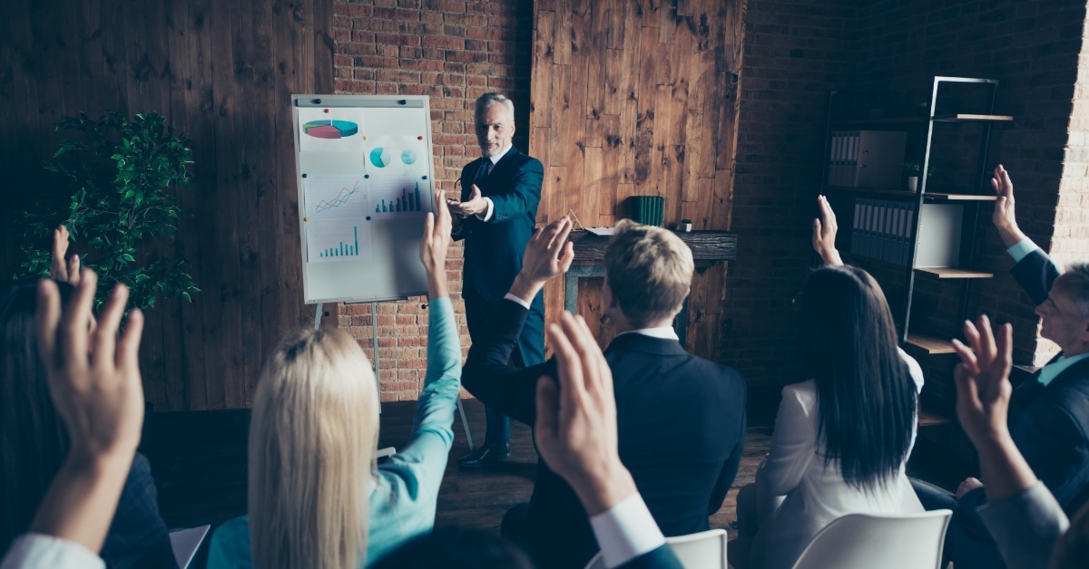 male speaker confronting people in class