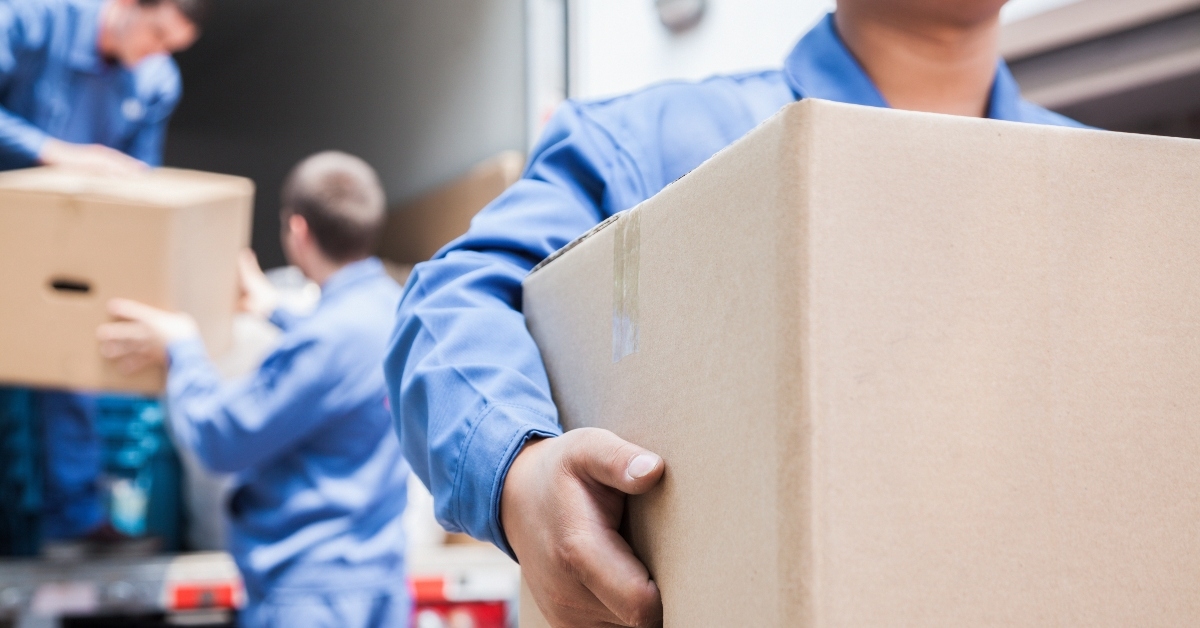 movers unloading a moving van