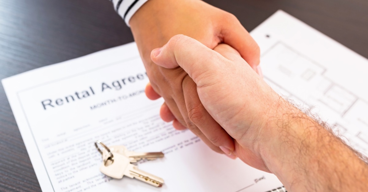 man shaking hand after making deal