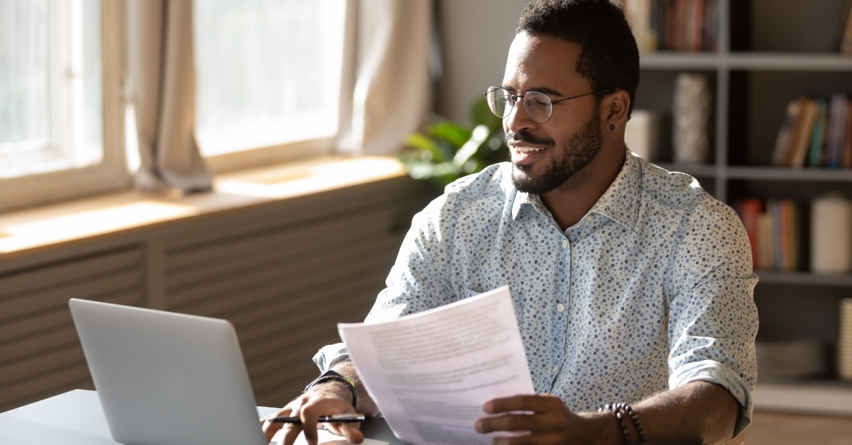 happy african american businessman at work