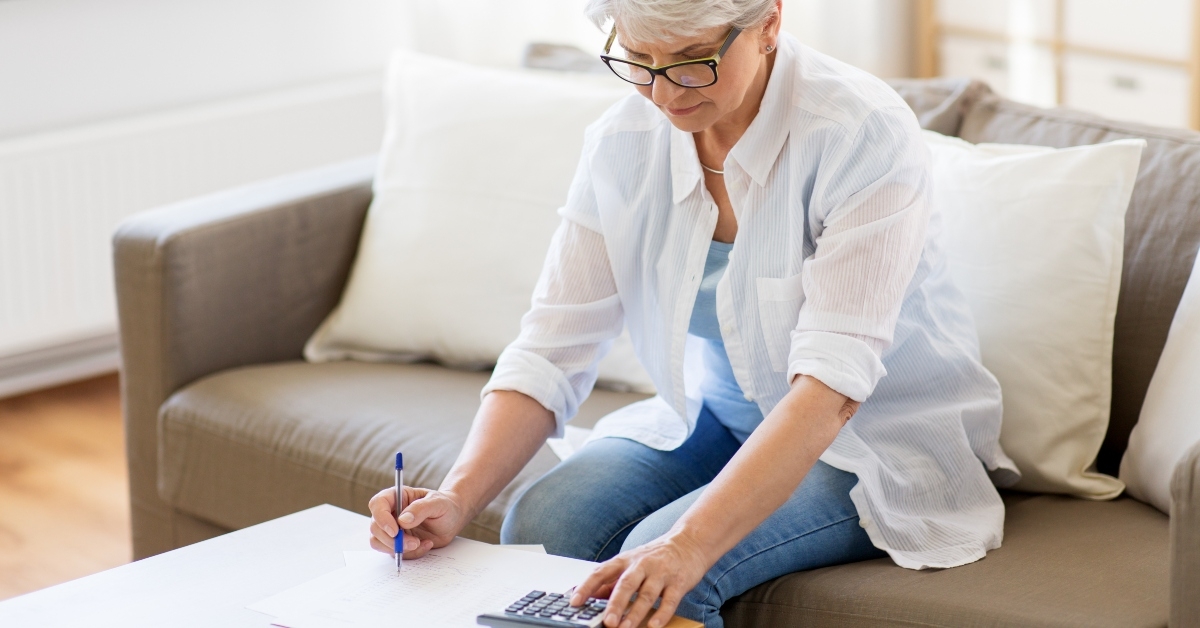 senior woman with papers