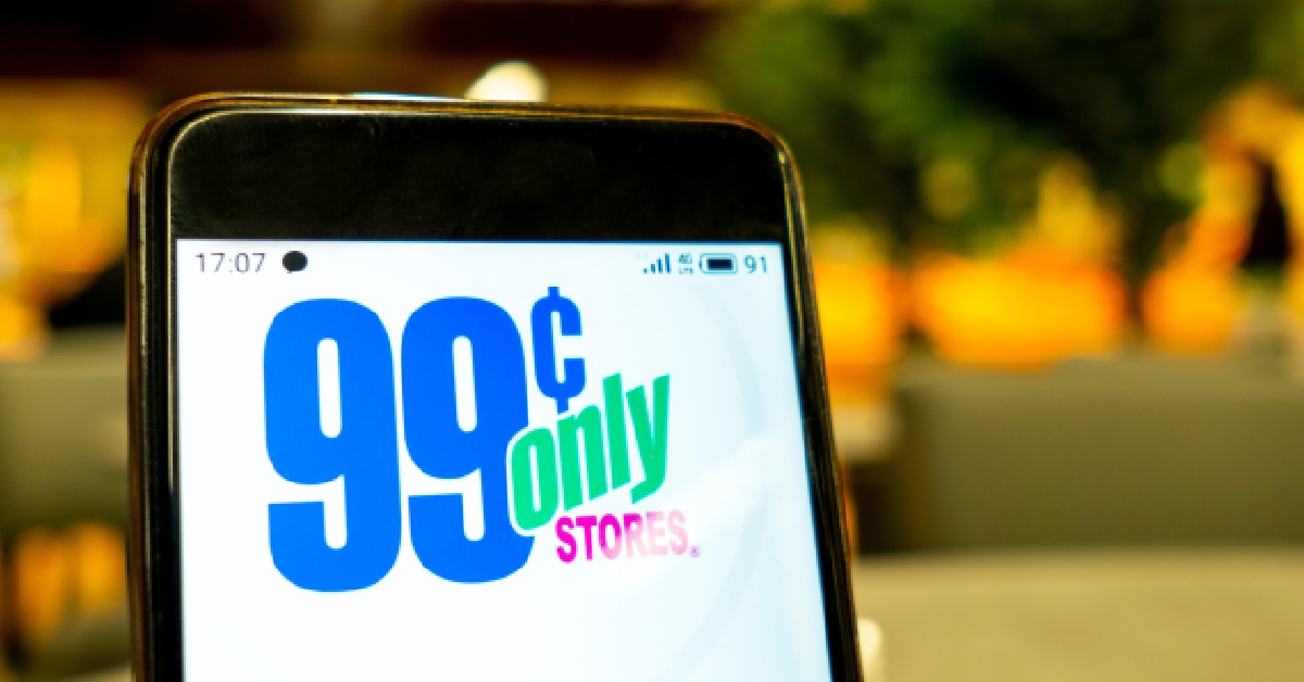 In this photo illustration the 99 cents store logo is seen displayed on a smartphone 