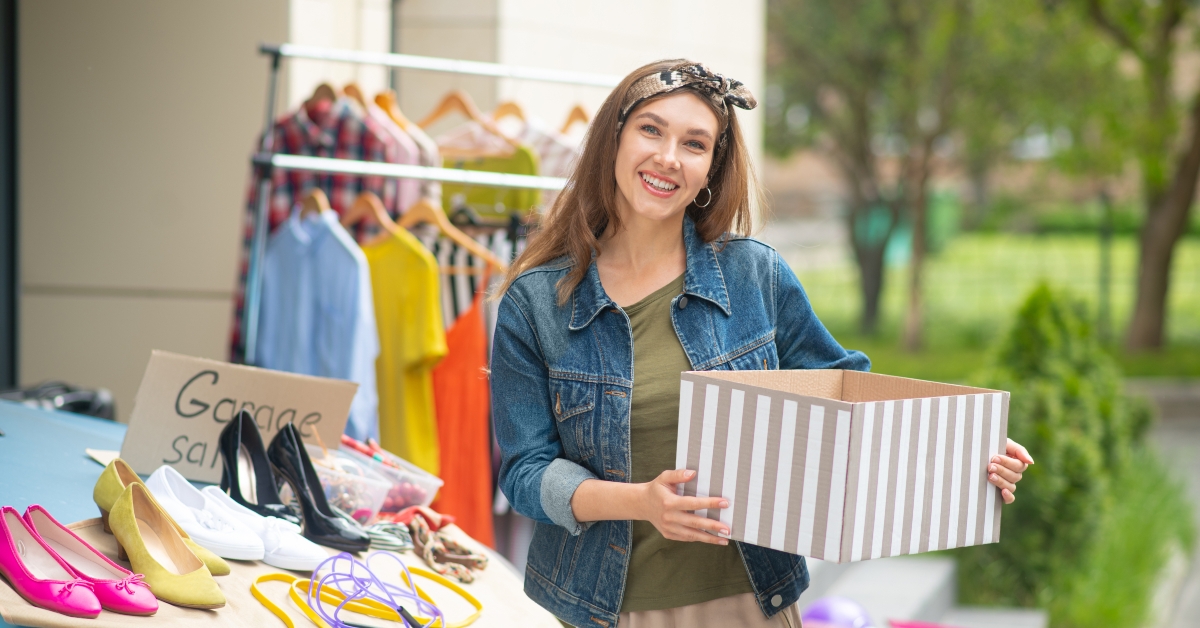 joyful woman holding a box