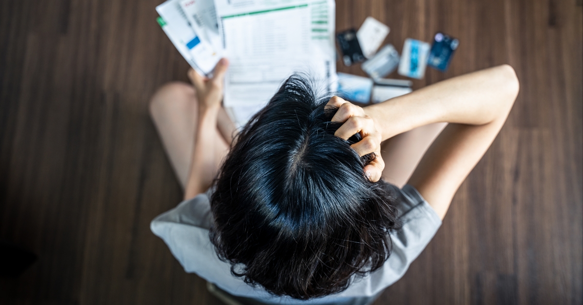 hands holding the head 