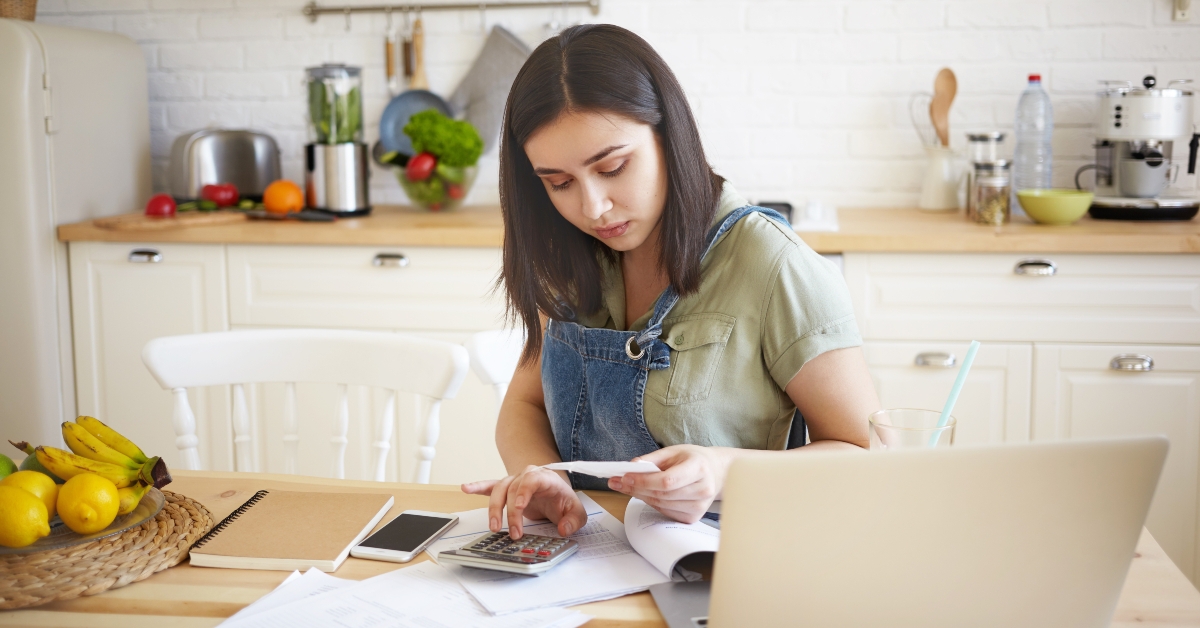 housewife paying bills