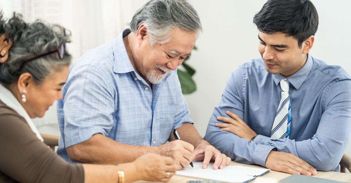 old man signs on paper