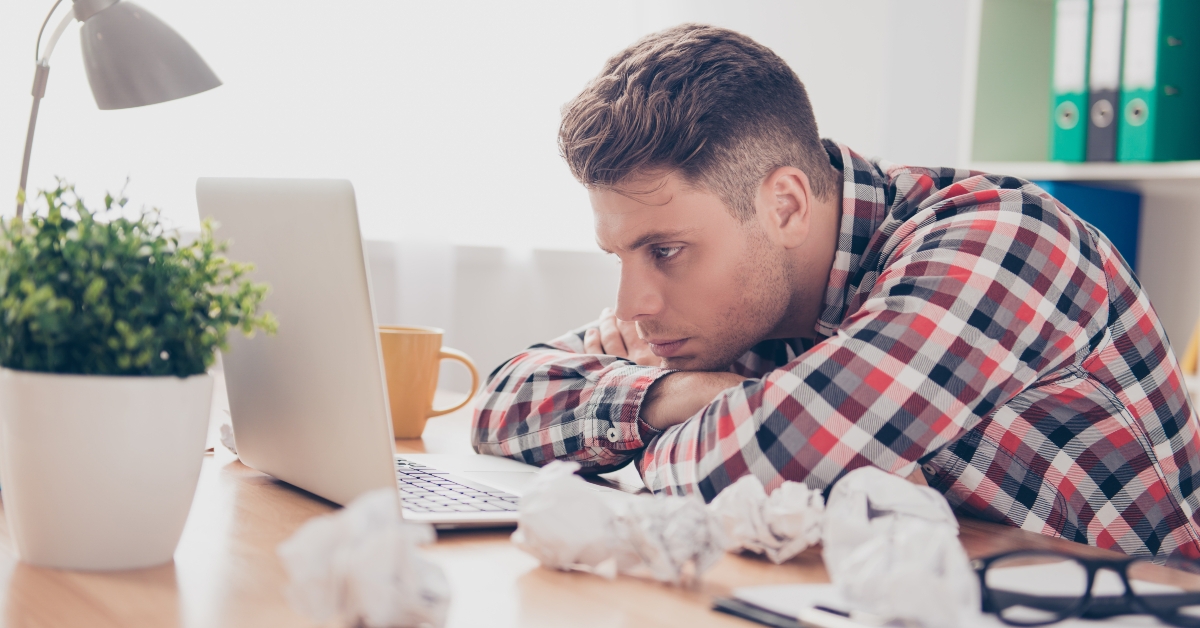 overworked young man