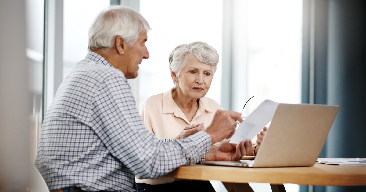  senior couple working on their finances