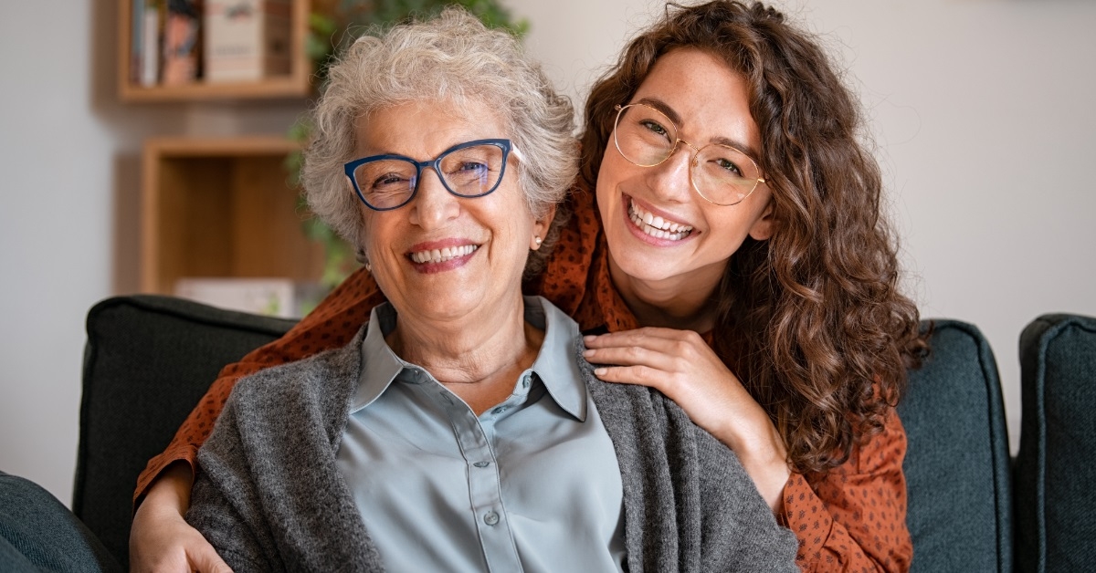 grandmother with granddaughter at home