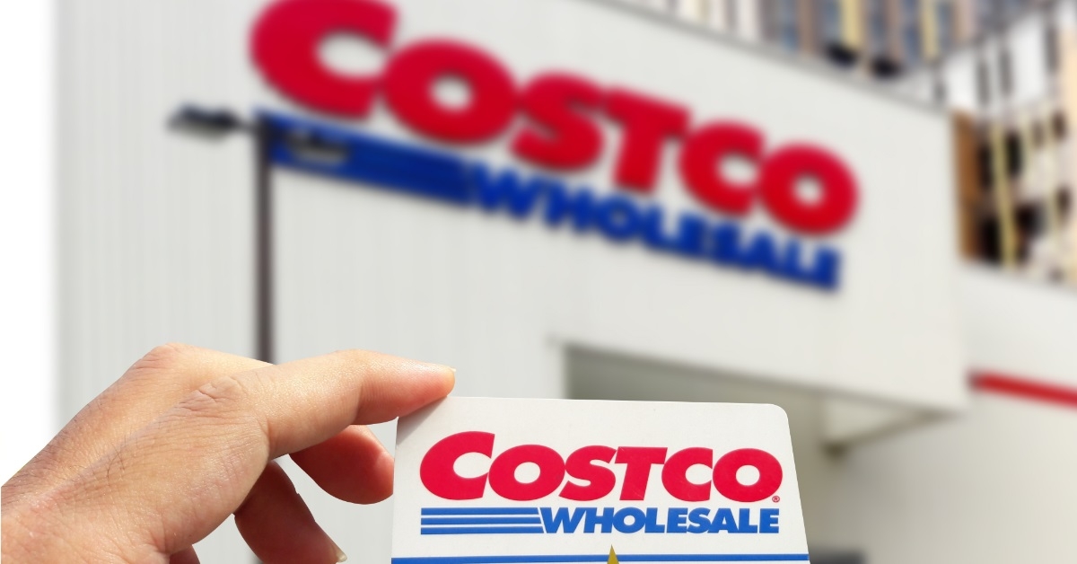 hand holding costco membership card outdoors