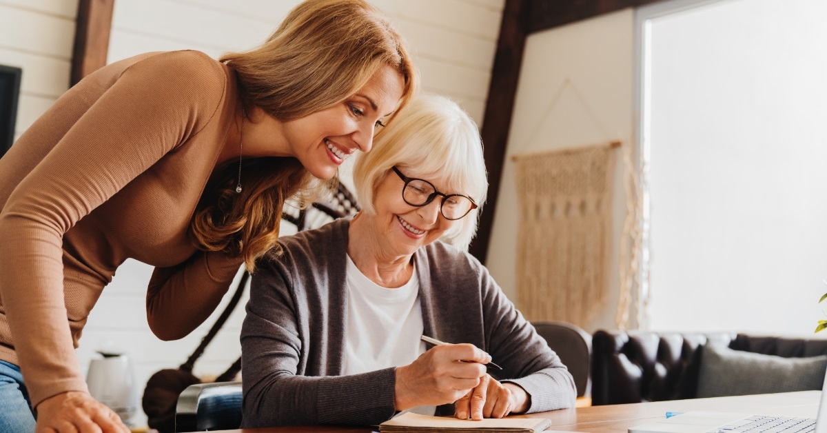 female Investment advisor consulting retired woman