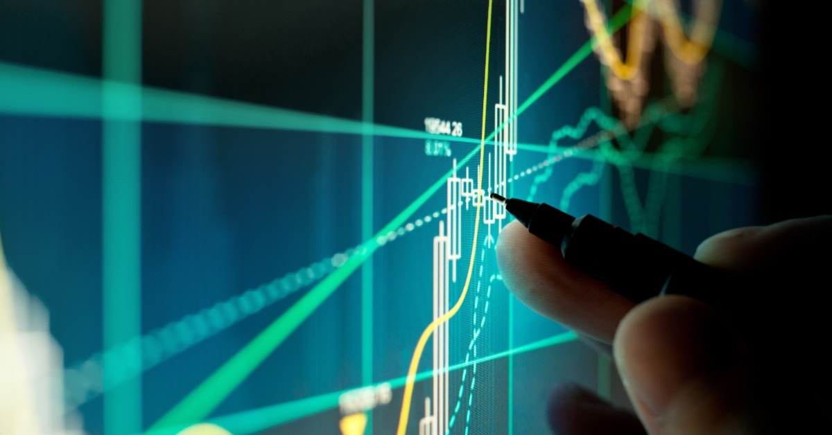 trader checking stocks on computer screen
