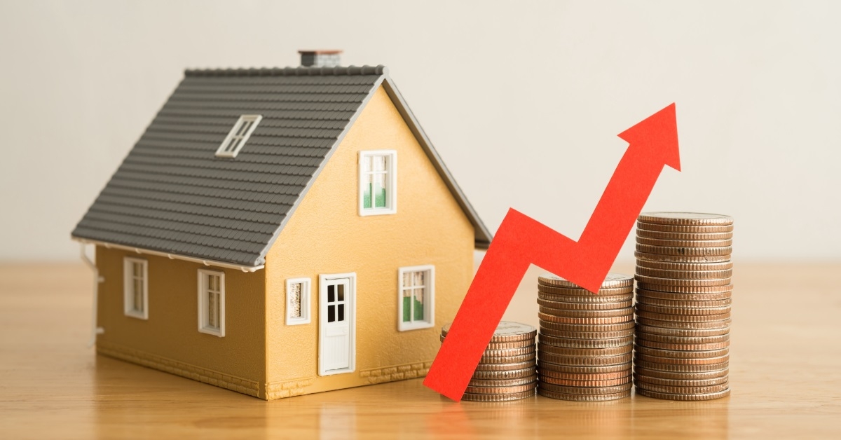 coins stack house sculpture mortgage concept