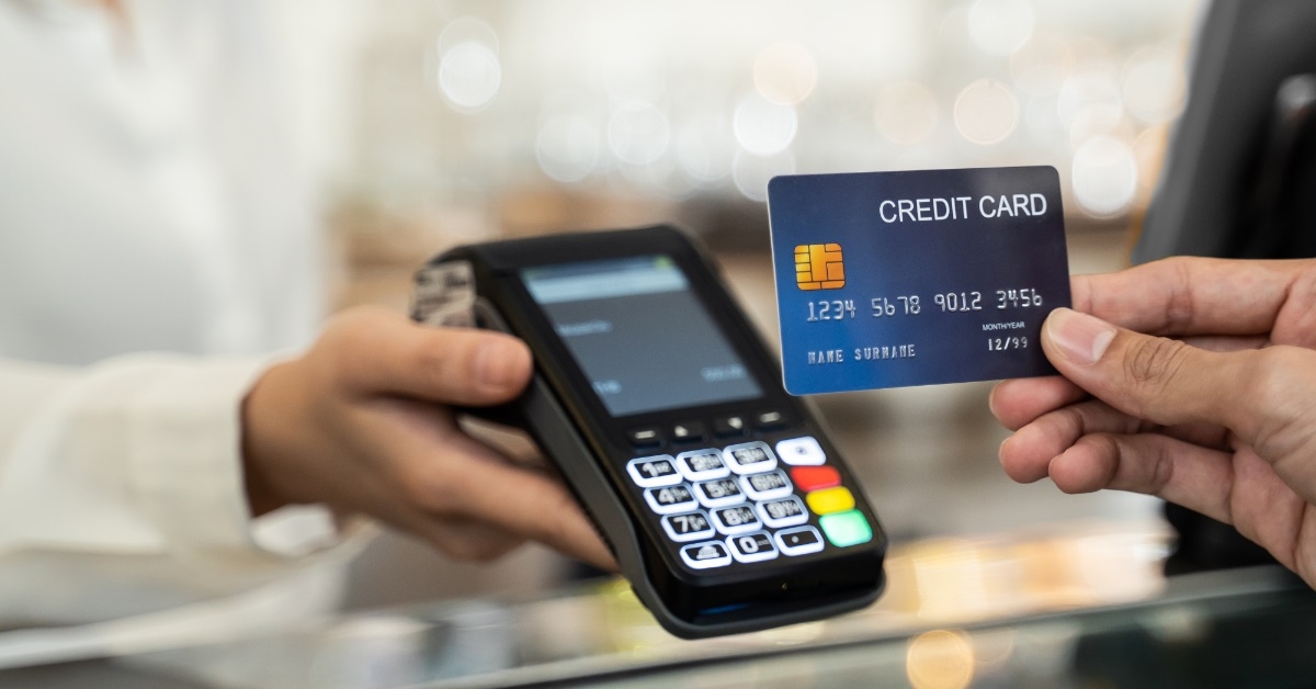 man using card for payment 