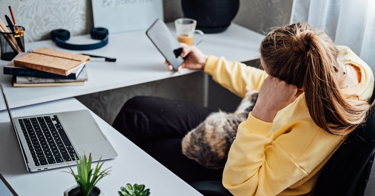 woman distracted from work