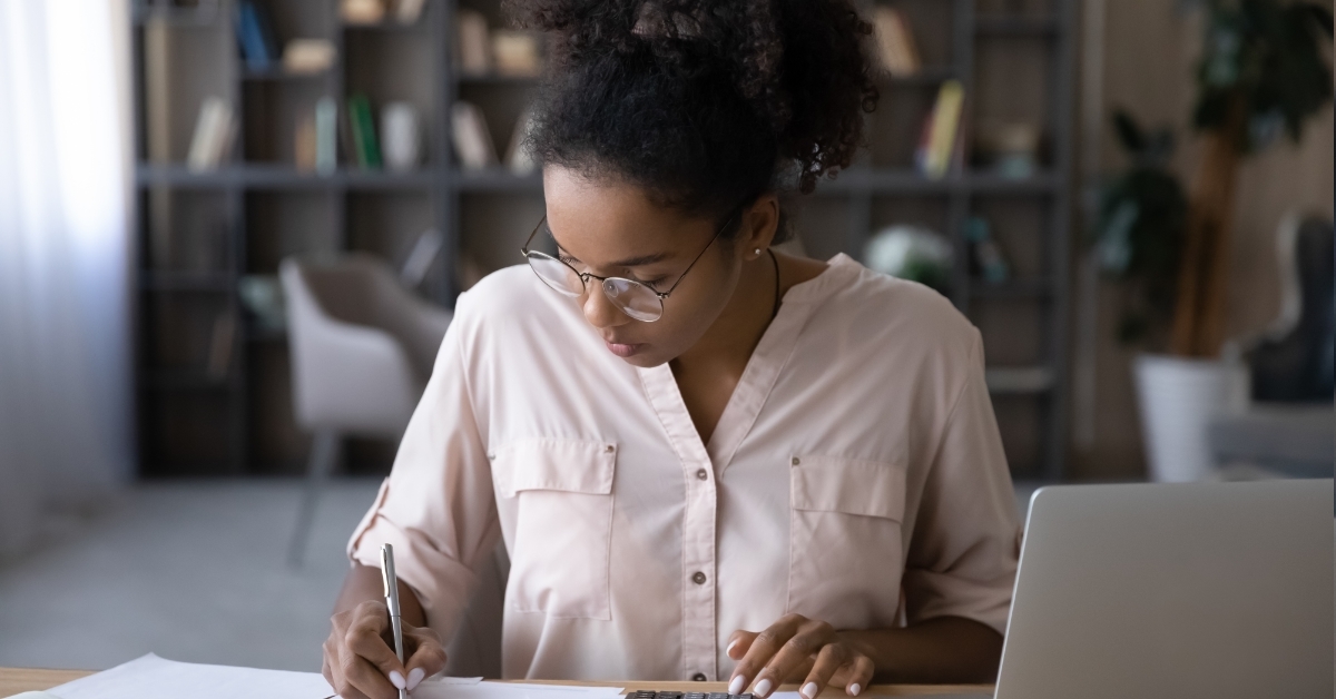 Africa American woman reviewing budget
