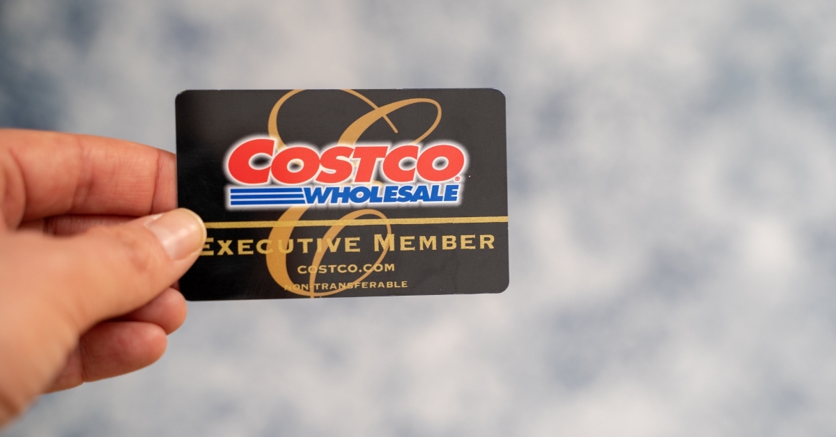 Hand holding Costco Executive Membership card