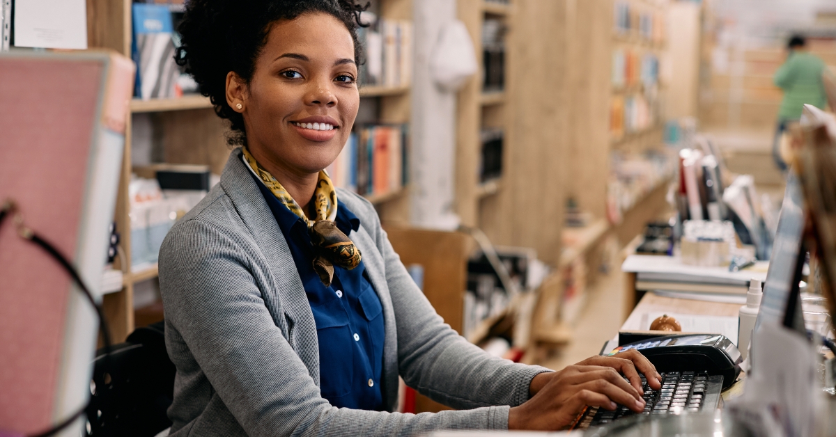 librarian works on computer 