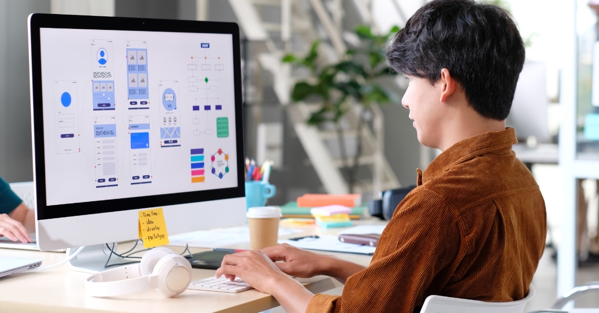 male website designer using computer