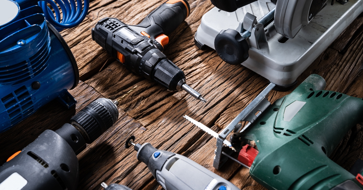 power tools on wooden desk