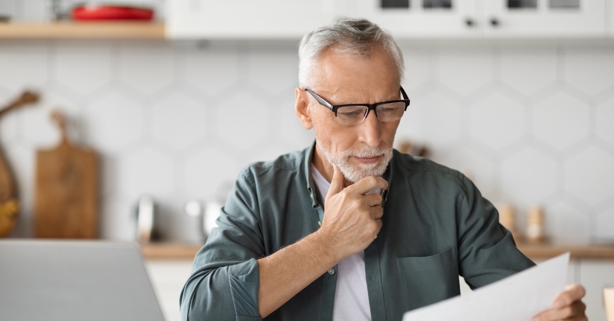 senior man working at home office