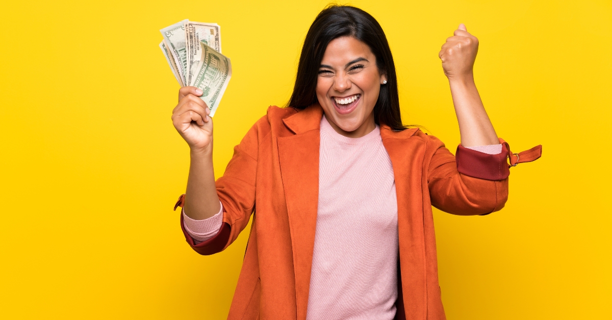 young girl taking money