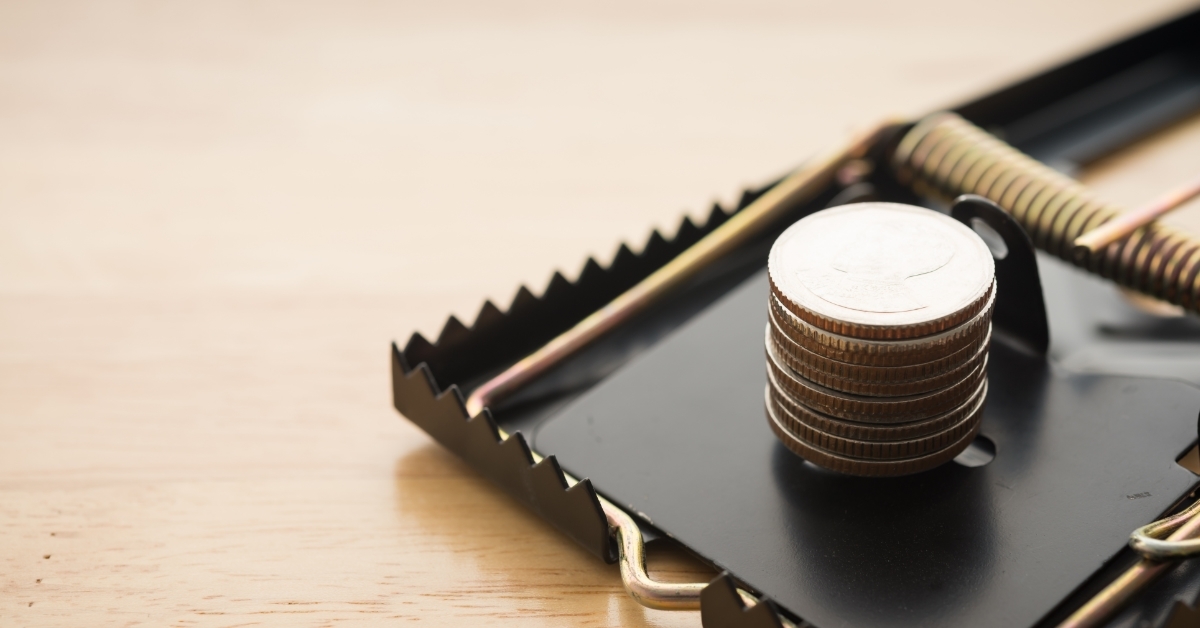 Stacked coins in rat trap 