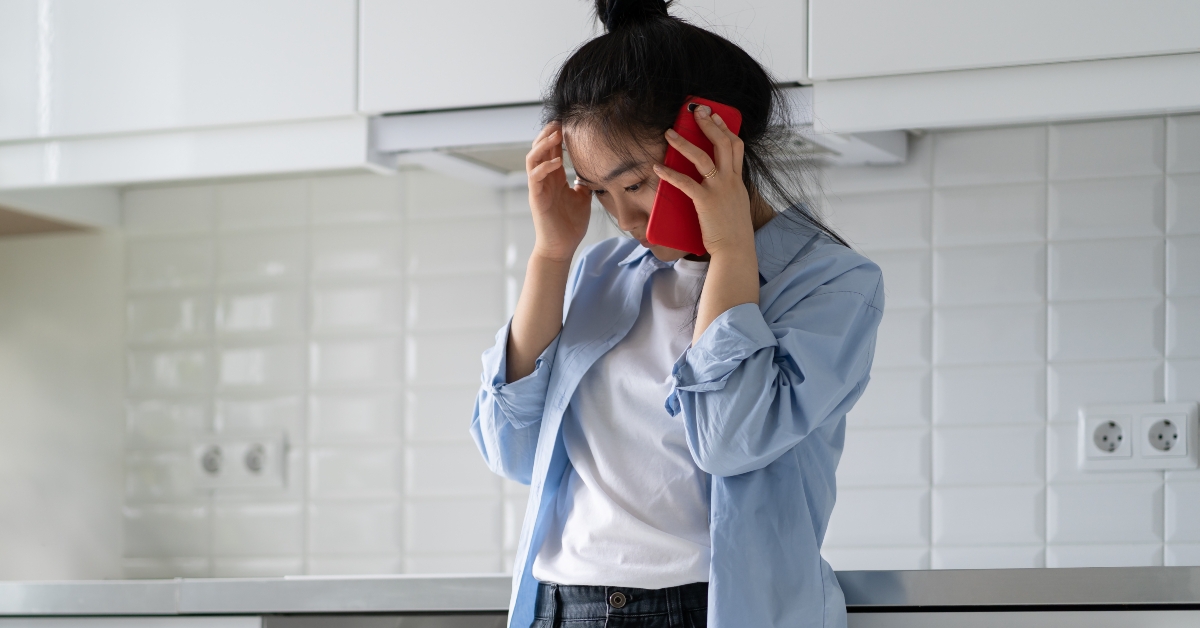 frustrated female making phone call