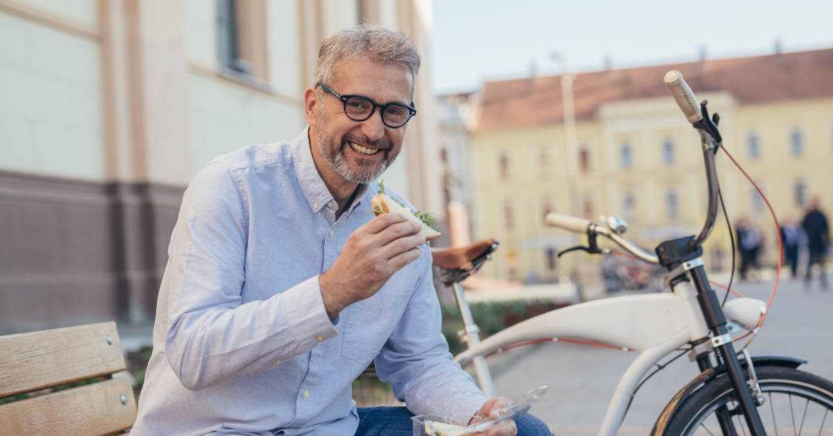 man eating sandwiches