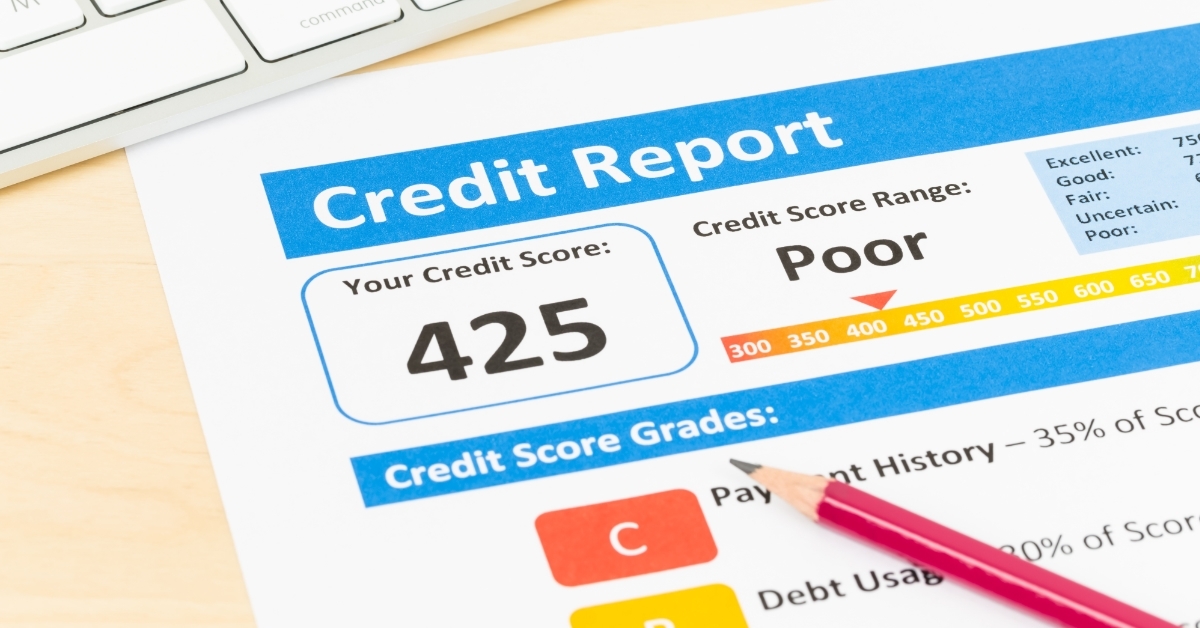 Poor credit score report with pen