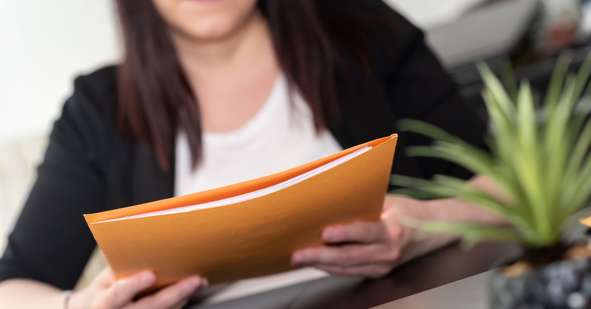 businesswoman holding folder