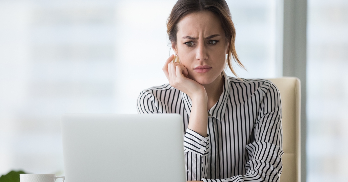 businesswoman annoyed by online problem
