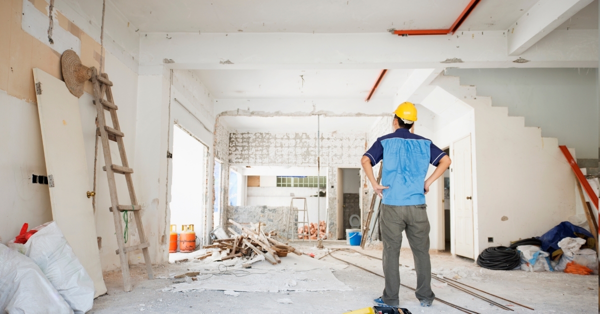 engineer inspecting house renovation indoors